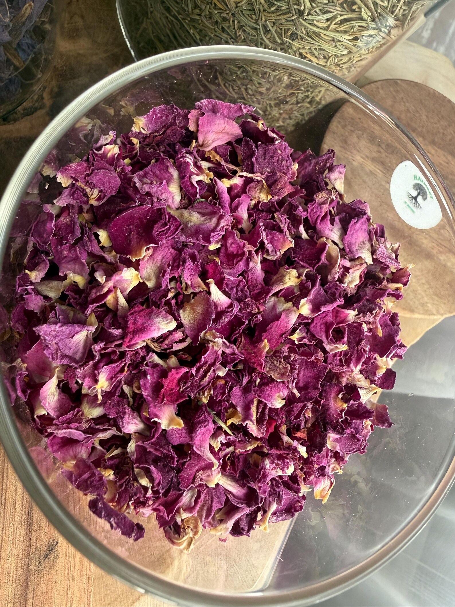 Damask rose petals in a glass jar