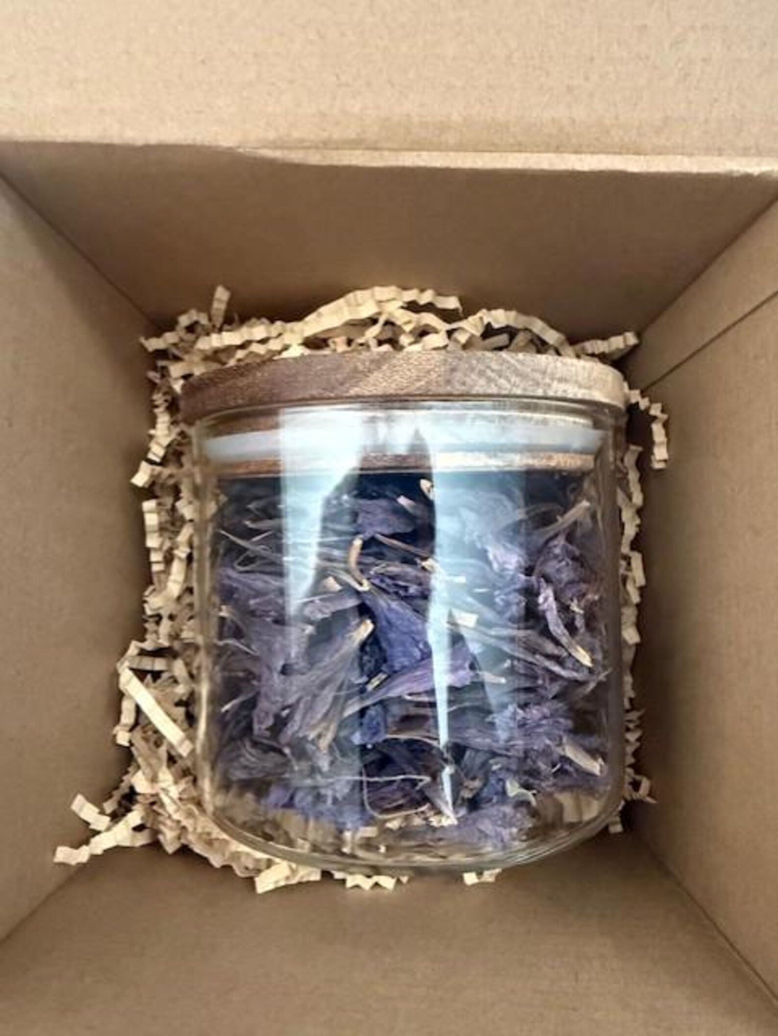 Cornflower blossoms in a glass jar